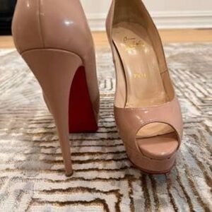 Christian Louboutin Authentic nude lady peep size 9